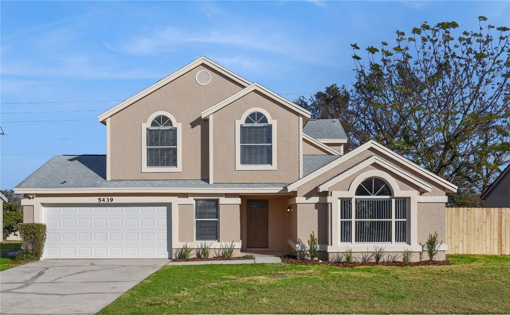 Photo of 5439 Red Bone Lane, Orlando, FL 32810 (MLS # O6376160)