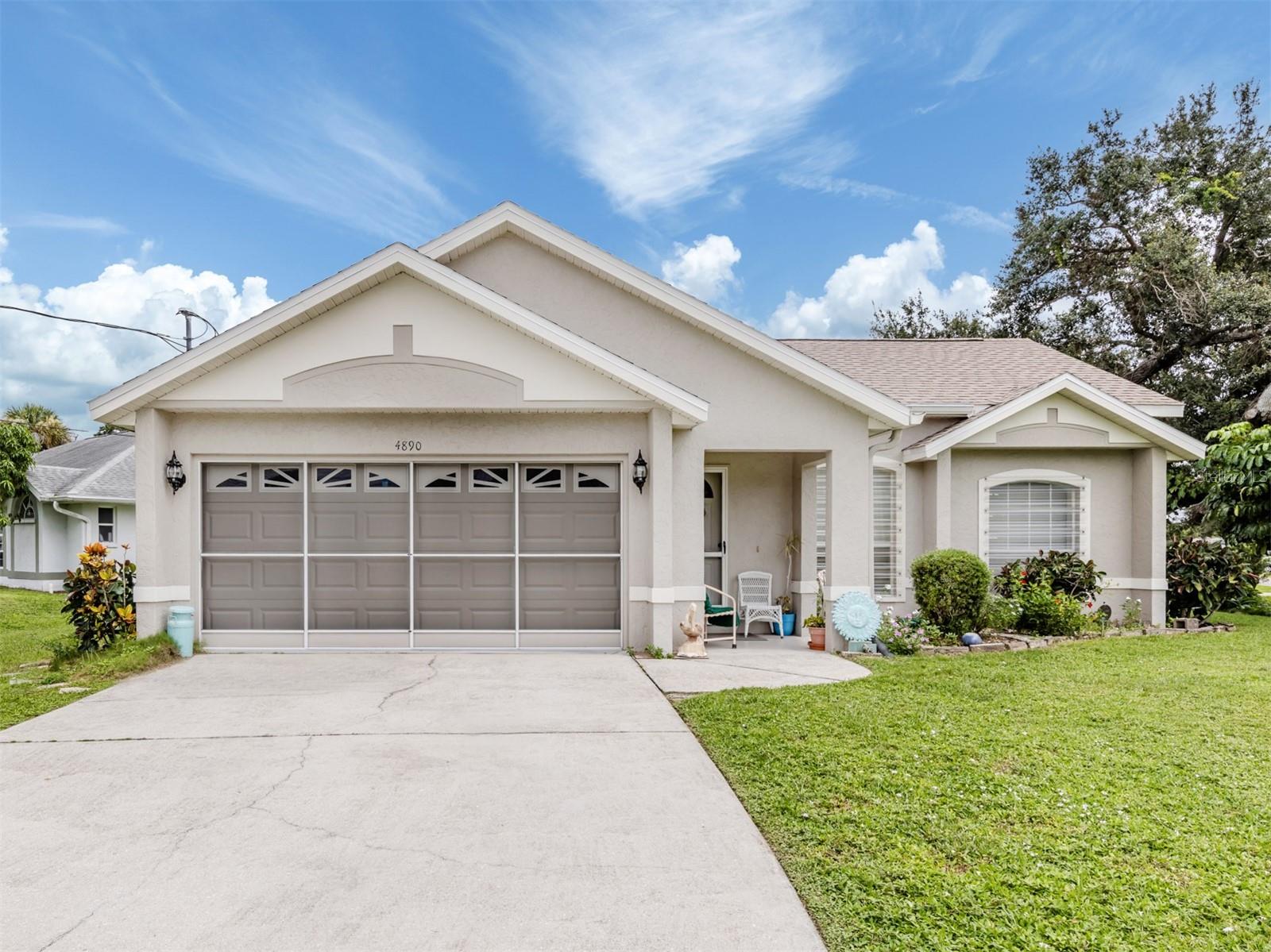 Welcome to this charming 3-bedroom, 2-bath single-family home perfectly situated on a corner lot in the heart of North Port, Florida. Inside, you’ll find vaulted ceilings throughout and a desirable split bedroom plan. The open kitchen, dining, and family room combination creates an inviting space for both everyday living and entertaining. Hardwood floors and crown molding add warmth and character to the main living areas, while the spacious master suite offers abundant natural light, two closets, and an ensuite bath that opens to a screened lanai—ideal for enjoying the Florida lifestyle. Two additional well-sized bedrooms share a convenient bath on the opposite side of the home, providing comfort and privacy for guests or family.
Recent updates include a roof that’s just two years old, a 2019 hot water heater, and two septic tanks for added efficiency. This property makes a wonderful starter home for families or a delightful winter retreat for snowbirds.
Nestled between Sarasota and Fort Myers, the City of North Port is one of Florida’s fastest-growing communities, known for its affordability, natural beauty, and small-town charm. Residents enjoy access to the Myakkahatchee Creek Environmental Park, Warm Mineral Springs, and miles of scenic waterways perfect for kayaking and boating. With excellent schools, shopping, dining, and a convenient location near Gulf beaches, North Port offers a relaxed yet active lifestyle that appeals to families, retirees, and seasonal residents alike.