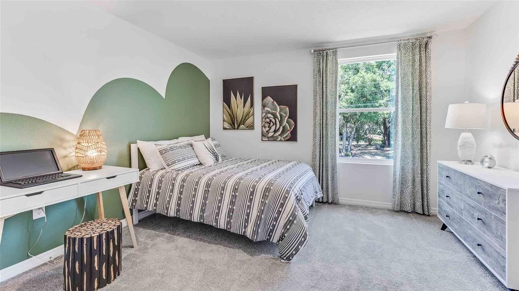 Photo of 10599 Gentle Rain Drive, Land O Lakes, FL 34638 (MLS # TB8437070)
