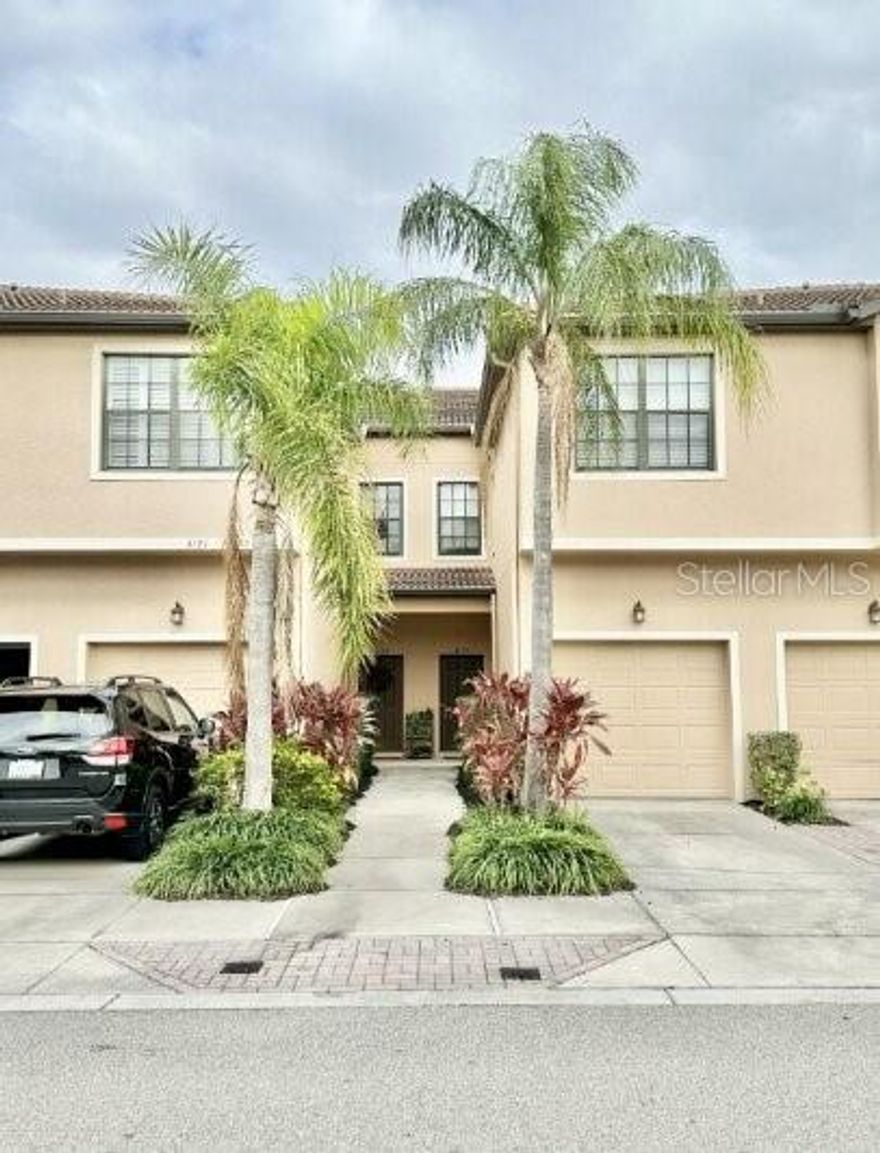 Beautifully maintained NO FLOOD ZONE 2-story townhome located in a quiet, centrally located Sarasota enclave just minutes from Downtown Sarasota and Siesta Key Beach. Enjoy peaceful lake views from the screened-in lanai—perfect for morning coffee or relaxing evenings. This spacious home offers 1,776 sq ft with an open floor plan, high ceilings, decorative trim, and brand-new laminate flooring on the main level. The kitchen features solid wood cabinetry, hard-surface countertops, stainless steel appliances (stove and microwave recently replaced), eat-in space, and a functional layout ideal for everyday living and entertaining.
Upstairs offers comfortable bedrooms with walk-in closets and well-appointed bathrooms, including both a walk-in shower and bathtub. Washer and dryer included. Additional highlights include a private 1-car garage, separate parking space, and neutral décor throughout.
Low monthly fees cover lawn maintenance, insurance, cable, gated access, and professional management. Pet-friendly community allowing up to two large pets. Conveniently located next to Urfer Park with walking trails and just minutes to I-75, Doctors Hospital, shopping, dining, and beaches. Meticulously maintained and move-in ready.  Schedule your private showing today.
