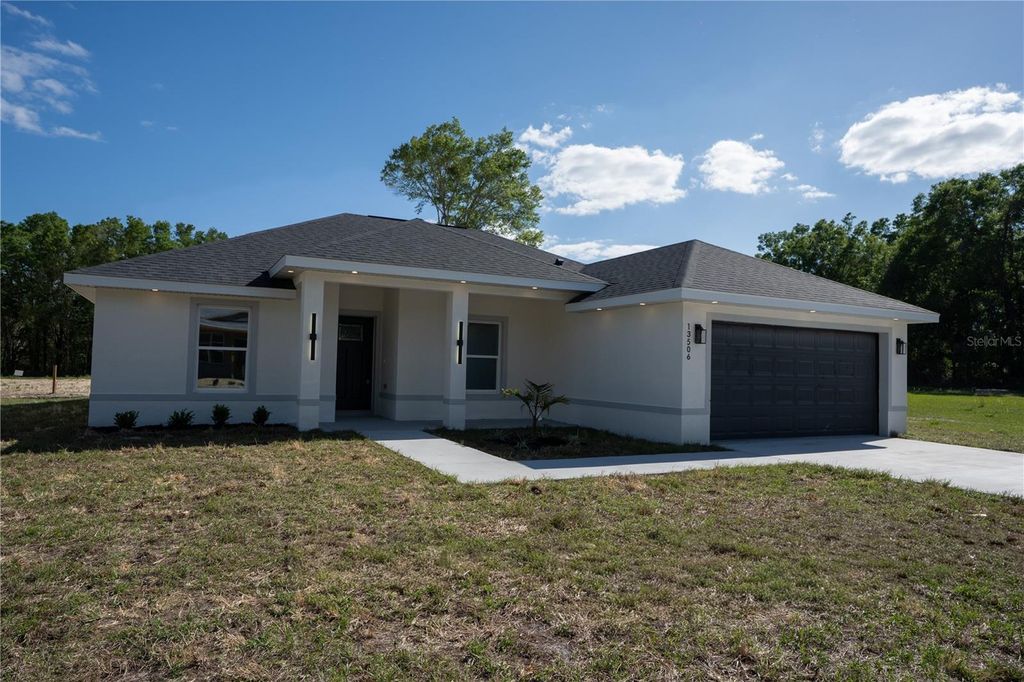 Photo of 13506 SW 106th Street, Dunnellon, FL 34432 (MLS # OM722748)