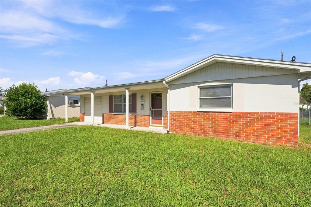 Photo of 3420 Blayton Street, Holiday, FL 34690 (MLS # TB8544871)