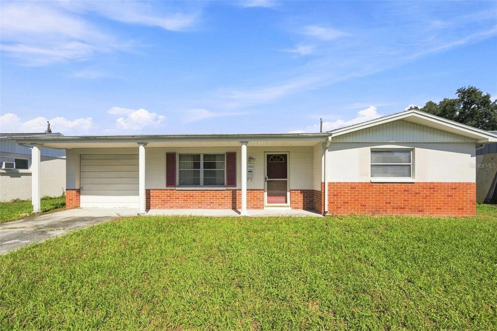 Photo of 3420 Blayton Street, Holiday, FL 34690 (MLS # TB8544871)