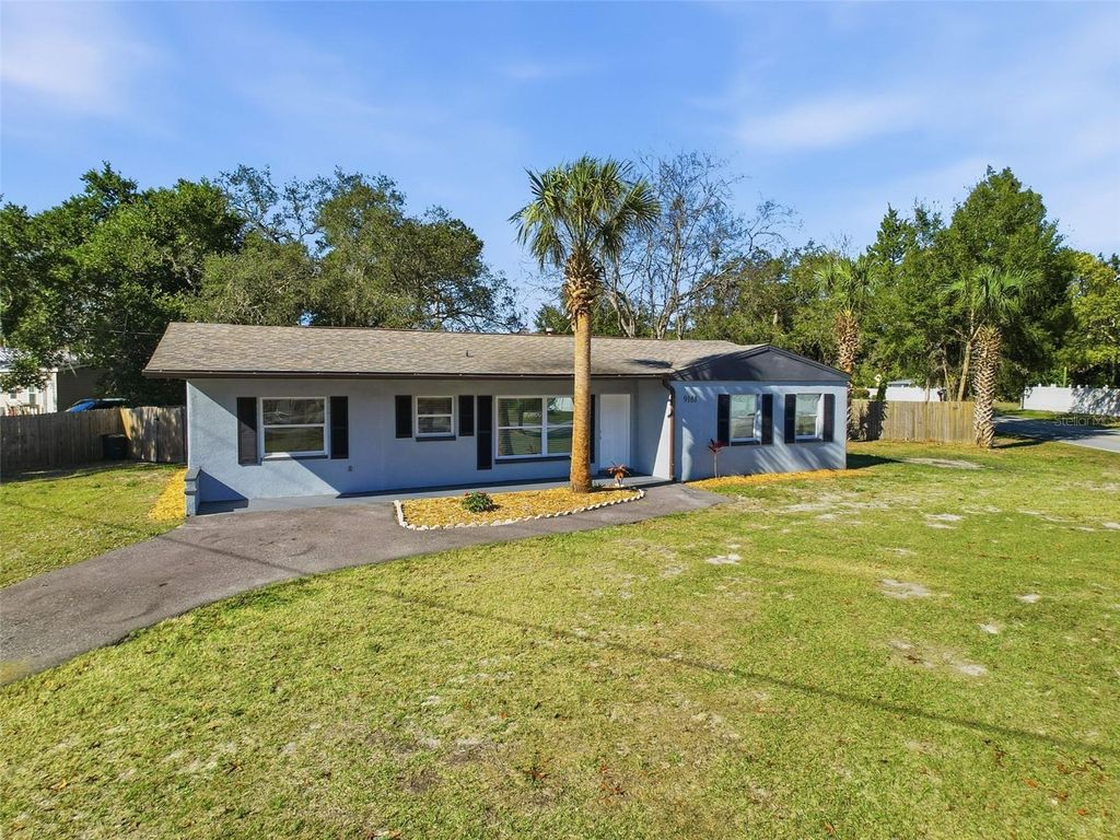Photo of 9161 Royal Palm Avenue, New Port Richey, FL 34654 (MLS # TB8463897)