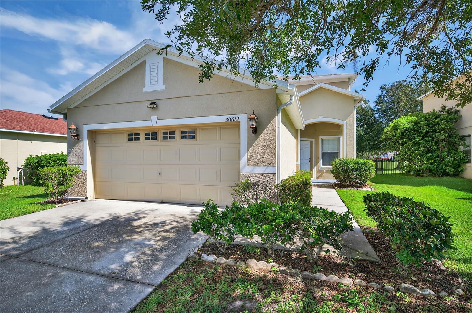 WELCOME HOME to this charming 4 bedroom, 2.5 bath home in the Country Walk community! The home is MOVE-IN ready and has a recently painted interior and new carpets. Other updates included a new roof in 2024, A/C and water heater in 2021. Great floorplan features separate dining and living areas, and a large eat-in kitchen with plenty of room for your center island breakfast bar addition, and a pantry closet. Rounding out the lower level includes bedroom 4, the half bath, and laundry room with a wash tub. Upstairs you’ll find the primary bedroom with en-suite bath, and two secondary bedrooms and another bathroom. Terrific location backing to an open field so no direct backyard neighbors. Other features include stainless steel appliances, two a/c units, 2 car garage with opener, ceiling fans in all rooms, and more. The County Walk community offers resort style amenities for its residents, including a clubhouse, pool, playground, tennis and basketball courts, fitness, and dog park. Convenient location between 54 & 56 means easy access to major roads, and loads of shopping, dining, and entertainment options.