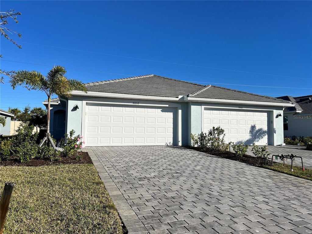 Photo of 8057 Shore Lake Drive, Englewood, FL 34224 (MLS # A4657881)