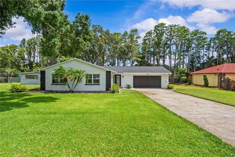 Photo of 210 Lake Hobbs Road, Lutz, FL 33548 (MLS # TB8402434)