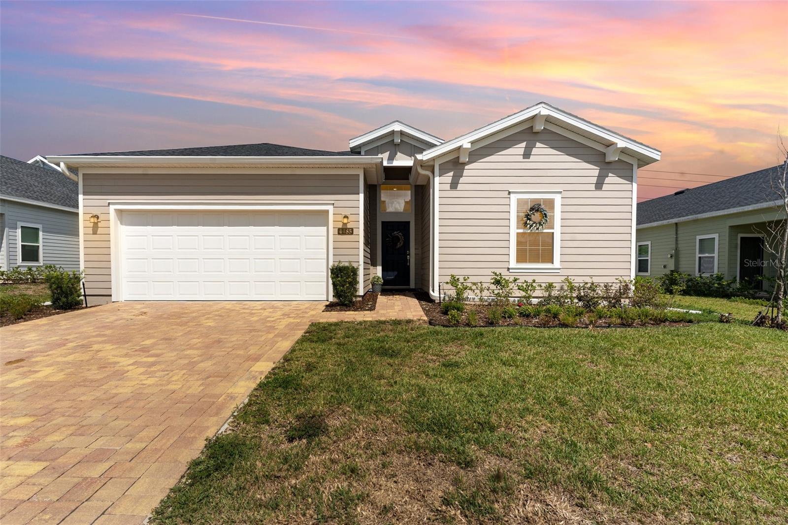 Step inside this stunning Lennar-built Trevi model—a 4-bedroom, 3-bath home that’s as functional as it is beautiful. The open layout boasts a gourmet kitchen with quartz countertops, a large breakfast bar, walk-in pantry, and café space overlooking the spacious family room, making it perfect for everyday living or entertaining.
The owner’s suite is a true retreat with two walk-in closets and a luxurious bath featuring a tiled shower, dual sinks, linen closet, and private water closet. Bedroom 2 includes its own en-suite full bath, ideal for guests. Step outside to the covered lanai, a perfect spot to relax and enjoy Florida living year-round.
Located in a sought-after masterplan community, you’ll love the convenience of nearby medical facilities, shopping, dining, and entertainment. This Trevi model is no longer available to build—don’t miss your chance to own this rare find!
Join us at an upcoming Open House Showcase or schedule your private tour today!