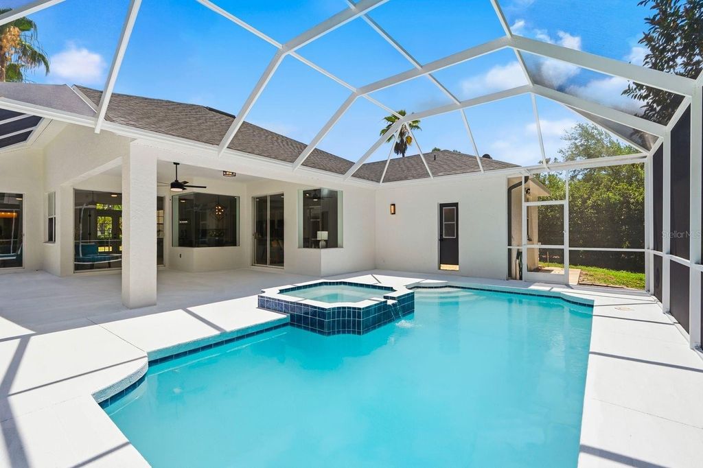 Photo of 11701 Winding Woods Way, Lakewood Ranch, FL 34202 (MLS # A4693576)