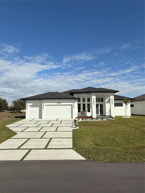 Photo of 264 W Pine Valley Lane, Rotonda West, FL 33947 (MLS # A4677532)