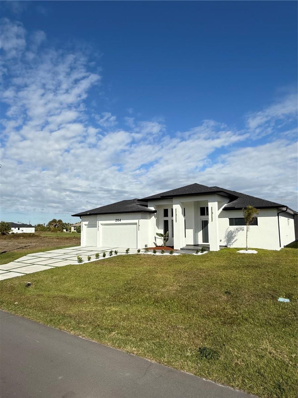 Photo of 264 W Pine Valley Lane, Rotonda West, FL 33947 (MLS # A4677532)