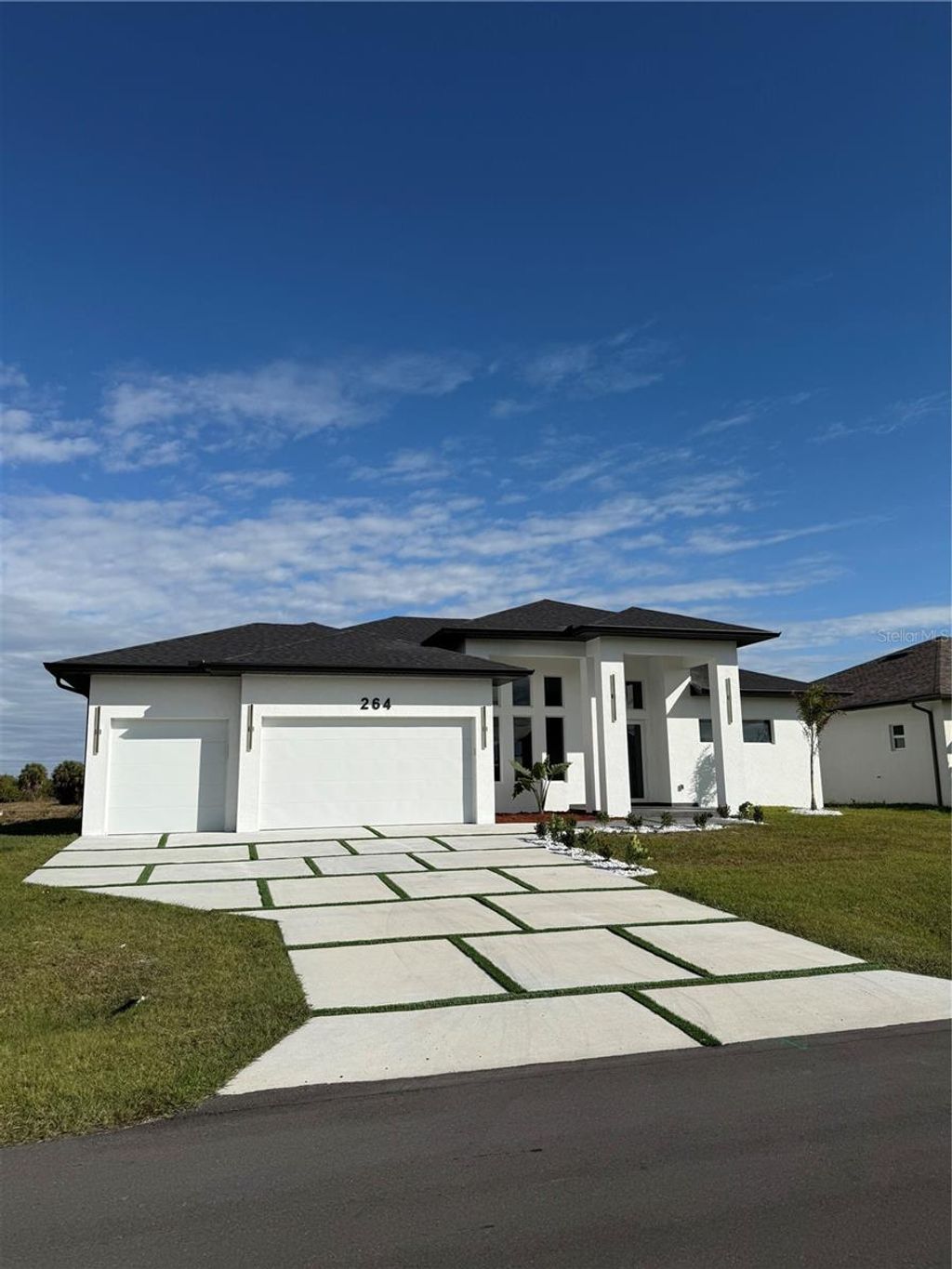 Photo of 264 W Pine Valley Lane, Rotonda West, FL 33947 (MLS # A4677532)
