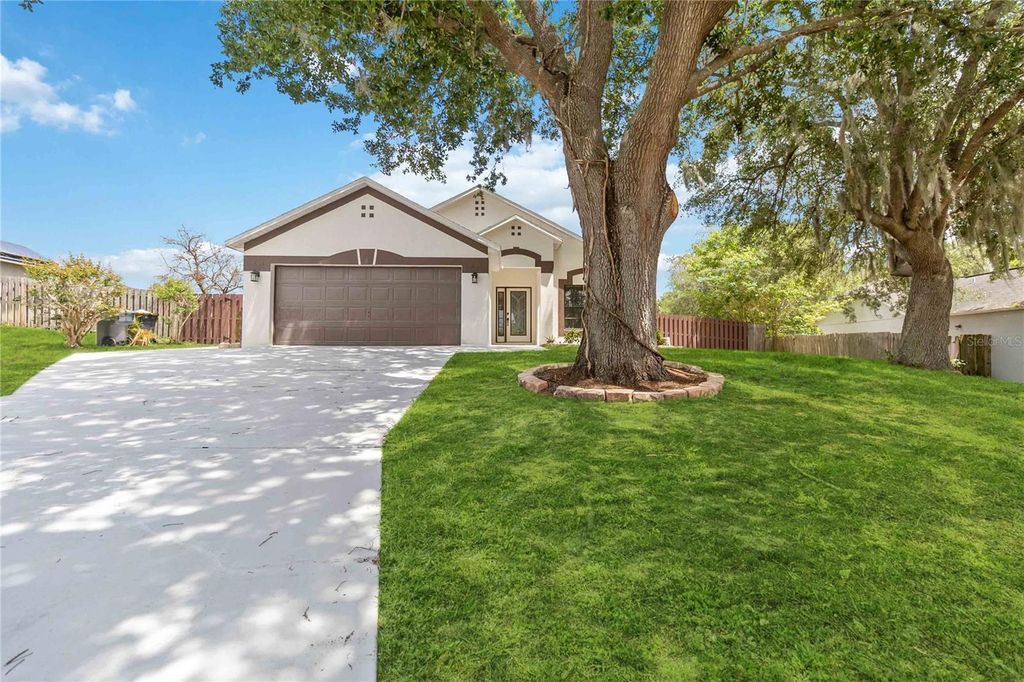 Photo of 232 Bent Oak Loop, Davenport, FL 33837 (MLS # O6396676)