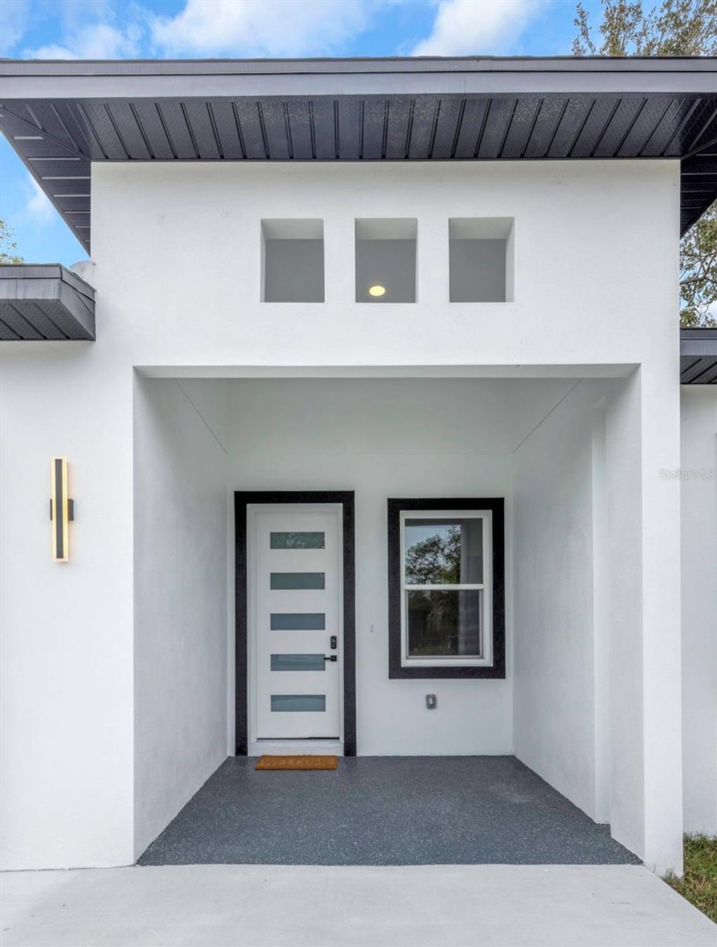 Photo of 303 Archimedes Street, Dunedin, FL 34698 (MLS # TB8467416)