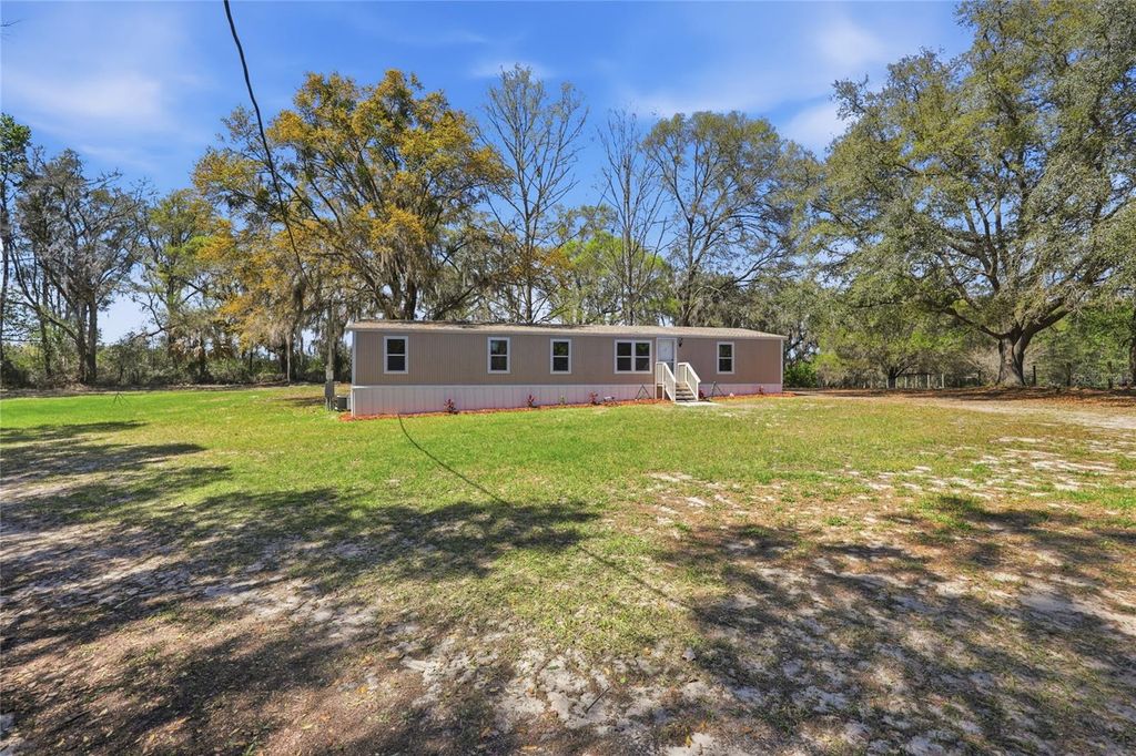Photo of 9015 SW 135th Place, Archer, FL 32618 (MLS # TB8488118)