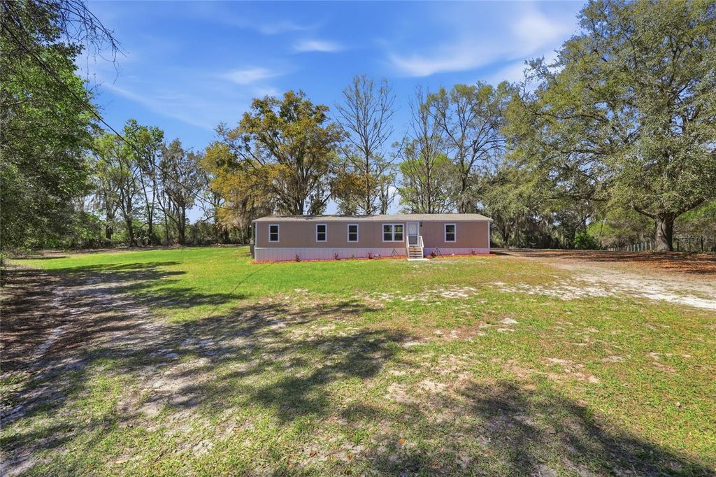 Photo of 9015 SW 135th Place, Archer, FL 32618 (MLS # TB8488118)