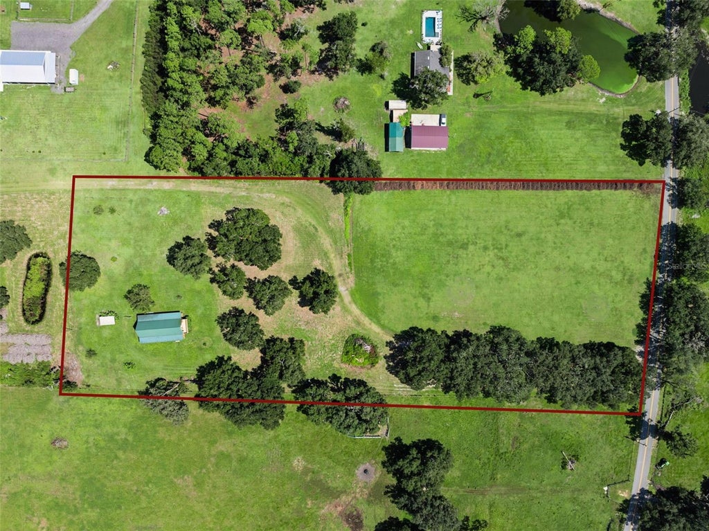 Photo of 1017 Sloans Ridge Road, Groveland, FL 34736 (MLS # O6450575)