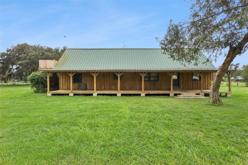 Photo of 1017 Sloans Ridge Road, Groveland, FL 34736 (MLS # O6450575)
