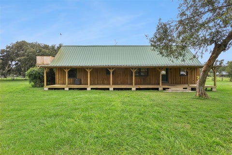 Photo of 1017 Sloans Ridge Road, Groveland, FL 34736 (MLS # O6450575)