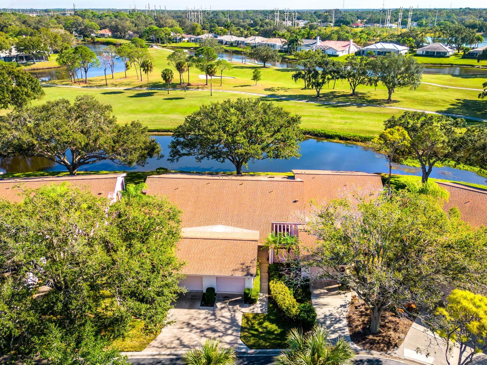 Spectacular pond framed by wide golf course views in The Meadows, a park-like oasis 15 minutes from downtown. In the desirable maintenance-free Hampstead Heath community, canopied streets, a tranquil cul-de-sac and a private front patio with pergola welcome you home. Inside, vaulted ceilings, large skylights and walls of sliders bring natural light and the outdoors in, creating a bright and tranquil ambiance. Plus, no neighbors in sight! You’ll enjoy the spacious great-room layout, ample kitchen with wood cabinetry and granite countertops, and the relaxing glassed-in lanai showcasing a daily parade of bird life there just to entertain you! The primary suite features a walk-in closet, double vanities, and walk-in shower. All half a block to the heated pool, just 2 miles to Whole Foods, and convenient to all that The Meadows has to offer. With a five-star location and on 1,600 park-like acres, The Meadows is a resort lifestyle community 15 minutes from downtown. Residents enjoy 14 miles of biking and hiking trails, fun-filled activities, fitness center, Jr. Olympic pool, pickleball courts, dining venues, and pay-to-play in a top tennis complex. Plus, close vicinity to the country's award-winning beaches, remarkable arts and culture, and just 2 miles from Nathan Benderson Park, the future MoteSEA Aquarium and Sarasota Orchestra, and The Mall at University Town Center: a world-class shopping, entertainment and dining destination. A fabulous Florida lifestyle awaits. 2024 roof, 2023 water heater, above Flood Plain (Zone X).