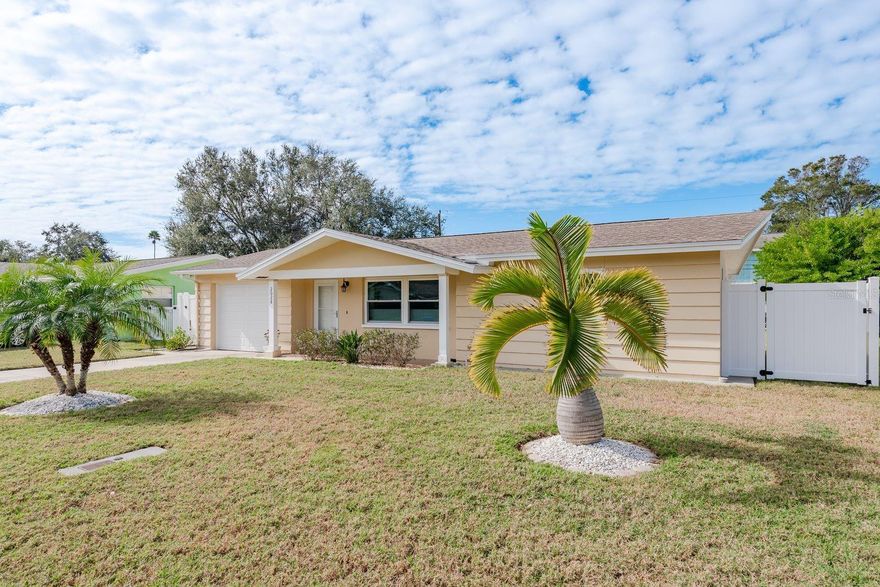 This move-in ready home is perfectly situated between vibrant, downtown Dunedin, less than two miles away, and Honeymoon Island State Park, just three miles away.  There is no HOA.  This home features two bedrooms, two bathrooms, a one-car garage and an open floor plan. The kitchen is light and bright with beautiful quartz countertops and tons of extra cabinet space. You will love the flexibility of the innovative top-down bottom-up shades in the living room.  The dining room provides you with views of the beautiful and spacious back yard.  The primary bathroom features a shower with a tub. The second bathroom is in the garage and has a shower.  The back yard is fully fenced with a large screened patio. For your outdoor recreational equipment, there is a storage room accessible from the back yard.  You will appreciate the pride of ownership and updates. The kitchen appliances,  cabinets and countertops were all replaced in 2025.  The HVAC, washer, dryer and tankless water heater were all replaced in 2024.  The fences were replaced in 2023.  The 200-amp circuit panel was installed in 2023.  The impact windows, impact garage door and impact exterior doors were all installed in 2021.  The roof was replaced in 2016.  This home is located in the Dunedin Golf Cart Zone and is two blocks from the Pinellas Trail.  The Dunedin Golf Club, Hammock Park, Dunedin Fine Art Center, Highlander Aquatic Complex are all very close. Beyond Dunedin, you will find world-famous Clearwater Beach and the Clearwater Marine Aquarium. Schedule your showing today so you can start living the Florida dream.