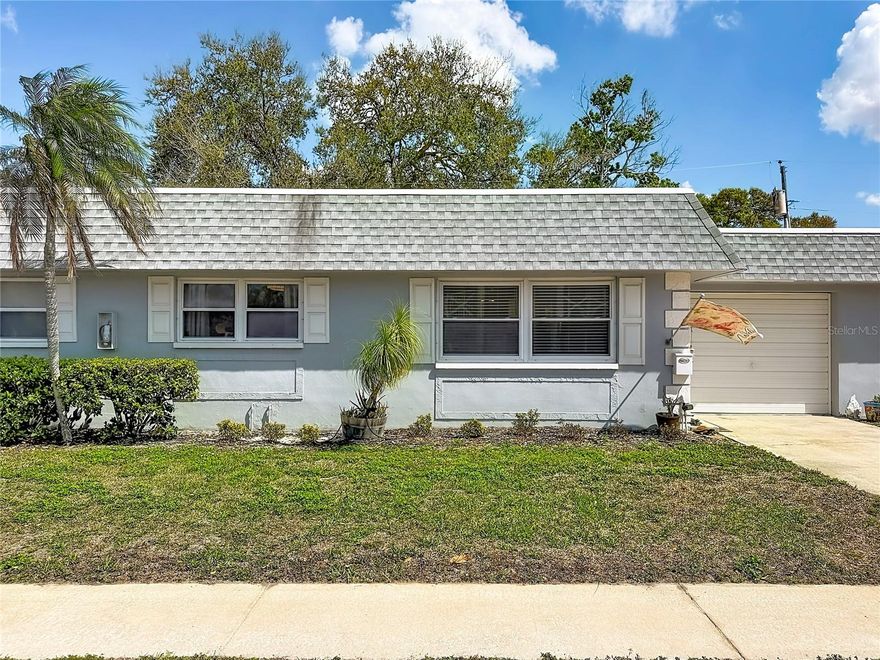 Beautifully updated villa with attached garage. Neutral color walls and ceramic tile flooring throughout. Updated Kitchen has an abundance of cabinets with soft close doors &
drawers, pull out shelves, 3 lazy-susan cabinets, wine fridge, Quartz Counter tops, and breakfast bar. Appliances are high quality stainless, French door refrigerator, double
convection oven, "smart" microwave. All the walls & Ceilings in the Living room, Kitchen & Breakfast room and hallway have been textured and painted. The master bedroom
has a full wall of closets, fresh paint and private bathroom with walk-in shower, new vanity & Mirror. Guest bathroom is also updated with neutral colors. All windows and
sliding doors were replaced with double pane glass. All the interior doors and closet doors have been replaced. The HVAC system replaced 2020, Hot water heater replaced
2023, Roof replaced 2016, Hot tub new in 2021. This unit has a nice semi-private back yard. The ground covering is artificial grass which is easy to maintain and always
looks great. Rothmoor Estates is a small community with only about 84 units. We have a pool and large clubhouse. The back gate opens into the Highland Rec Center which
has many amenities. There is a water park, tennis, ball field, inside and outside playgrounds, indoor & outdoor fitness center and walking trails. Maintence fee includes:
Water, Sewer, Trash, Cable, Internet, lawn mowing, exterior maintenance and much more. The central location makes traveling easy. 30 minutes to Tampa International, 10
minutes to St.Pete/Clearwater regional airport. 5 miles to the Gulf of Mexico and our lovely white sand beaches.