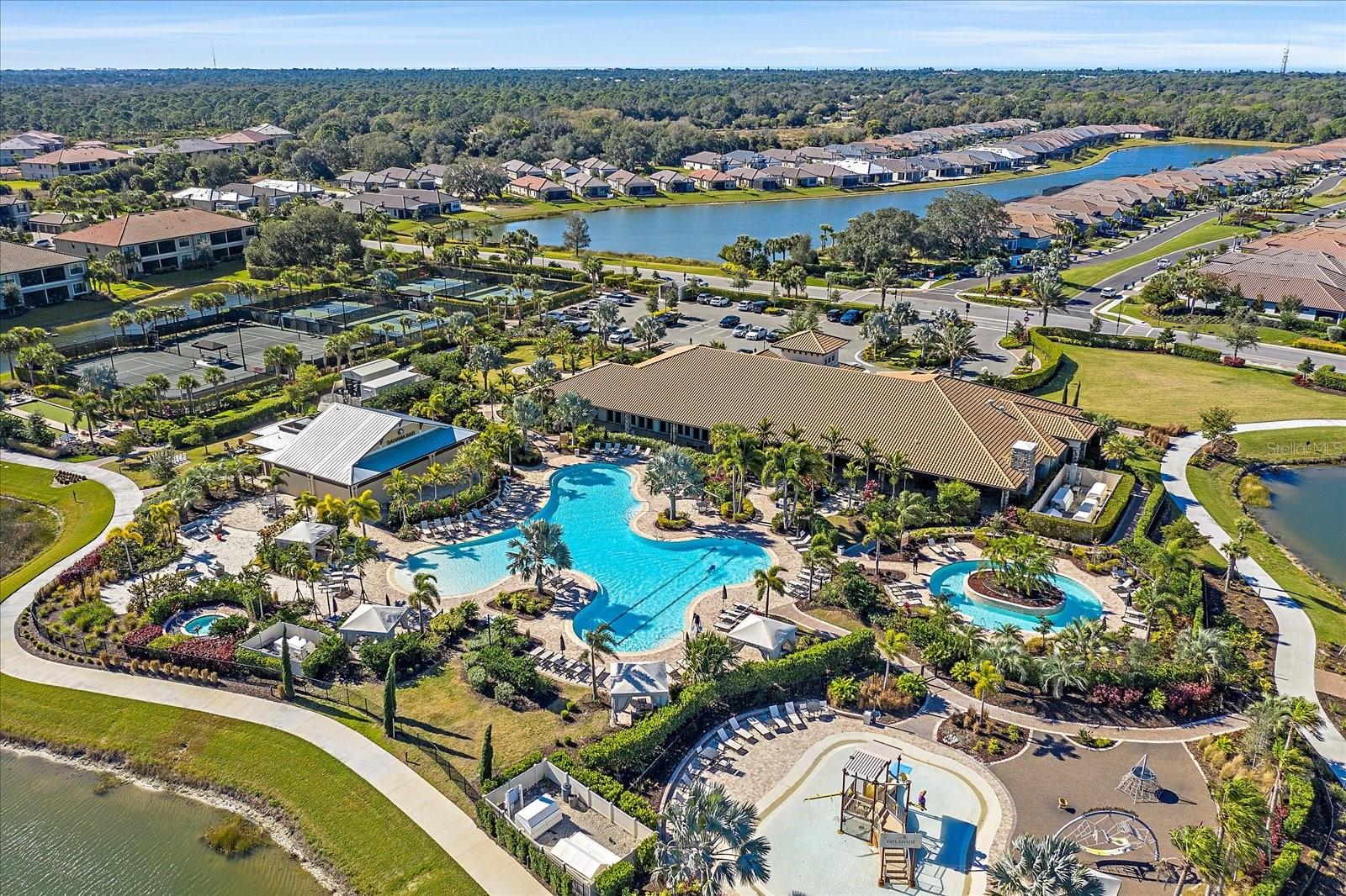 Welcome home to The Esplanade on Palmer Ranch! Resort Style living in one of Sarasota's award winning luxury communities. This is the corner unit on a cul-de-sac custom designed by Taylor Morrison and offers an exceptional floor plan for living and entertaining. The kitchen is a chef's dream with top of the line appliances, Granite countertops and a generous island with seating that opens to the living room. This 1st floor unit offers complete privacy, with an enclosed patio looking out to a beautiful lake. The open floor plan with high ceilings flows easily through the living room to access your private patio, where you can capture picturesque lake views. The primary bedroom is a true retreat with large windows, designer walk in closet space, and plenty of natural light. The ensuite features a large walk-in shower with a glass door and granite countertops adorning the custom double vanity. The second bedroom has ample closet space, large windows. The split bedroom floor plan provides plenty of privacy for daily life. This unit has a large laundry room with cabinets for storage and includes a washer and dryer. This corner unit features extra windows to the side that look out to nature, enhancing and adding natural light inside. This unit comes with 1 assigned garage parking space and surface parking spaces. The Esplanade on Palmer Ranch is like a private resort in your own backyard. A gated community with an elegant amenity center has lounge areas, a catering kitchen, wellness services, and a fabulous fitness center. Outdoor recreational facilities include an incredible resort-style pool and spa, also with a wade resistance exercise pool. The Bahama Bar is our very own pool side restaurant with an ever updating food menu and a full bar. There are miles of breathtakingly beautiful nature trails that connect to The Legacy Trail via private gate. The community features pickleball, tennis courts, bocce ball and hosts tournaments, clubs, dinners, holiday concerts and events year round. This is one of the most sought out units in the neighborhood! A rare opportunity to enjoy resort style living with amazing luxury amenities in a gated community just minutes to Siesta Key!
Available Nov 1, 2024