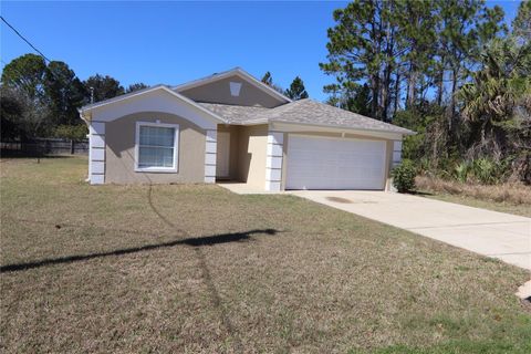 Photo of 53 Brownstone Lane, Palm Coast, FL 32137 (MLS # FC316788)