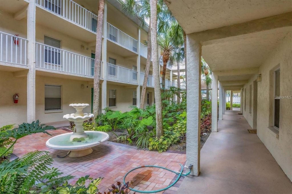 Photo of 7294 Cloister Drive #9, Sarasota, FL 34231 (MLS # A4691156)