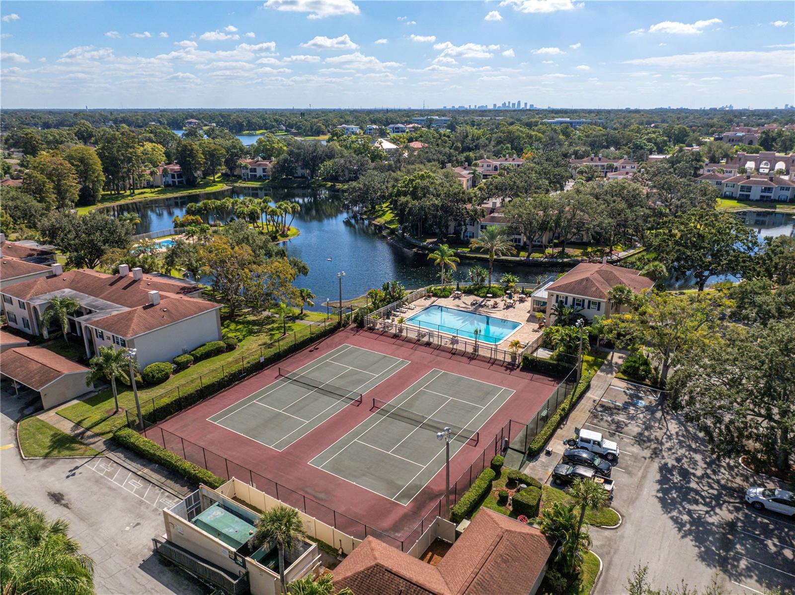 THE GRAND AT OLDE CARROLLWOOD CONDOMINIUM - Residential
