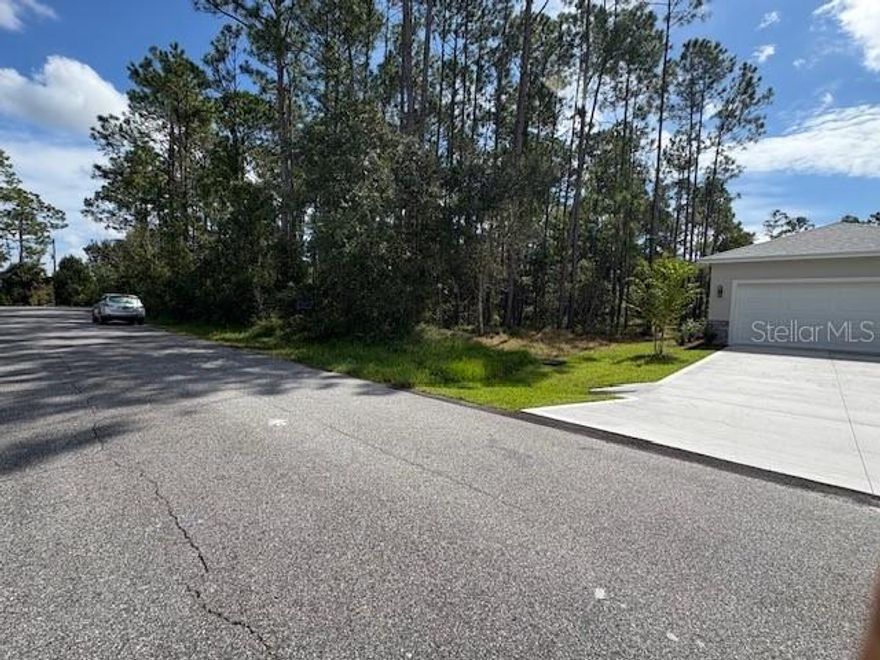 Build your next home or investment on a quiet cul-de-sac in Palm Coast’s desirable Seminole Woods area—surrounded by established homes and city conveniences. This homesite sits on a paved, city-maintained road with city utilities available (water/sewer via City of Palm Coast Utility) and no HOA or CDD, keeping ownership simple and carrying costs low. Minutes to Town Center shopping/dining at Palm Coast Landing (Target, TJ Maxx, Ross, Ultra, PetSmart), EPIC Theatres, parks, and miles of walking/bike trails including the Lehigh Trail. Golfers will love proximity to Cypress Knoll, Pine Lakes, and Palm Harbor courses. Health care is close by at Advent Health Palm Coast and the newer Advent Health Palm Coast Parkway hospital. Zoned Flagler Schools with nearby Bunnell Elementary, Buddy Taylor Middle, and Flagler-Palm Coast High. A quite community, accessible location with strong growth, nearby new construction, and easy beach access—ideal for a primary home, spec build, or long-term hold. Buyer to verify all information and suitability for intended use.