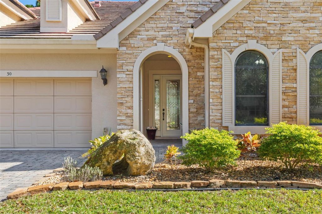 Photo of 30 Lakeside Drive, Palm Coast, FL 32137 (MLS # FC314357)