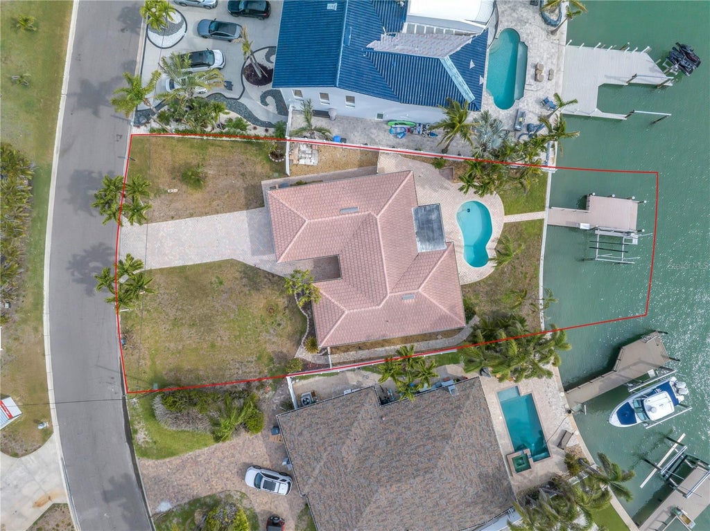 Photo of 10128 Yacht Club Drive, Treasure Island, FL 33706 (MLS # TB8557436)