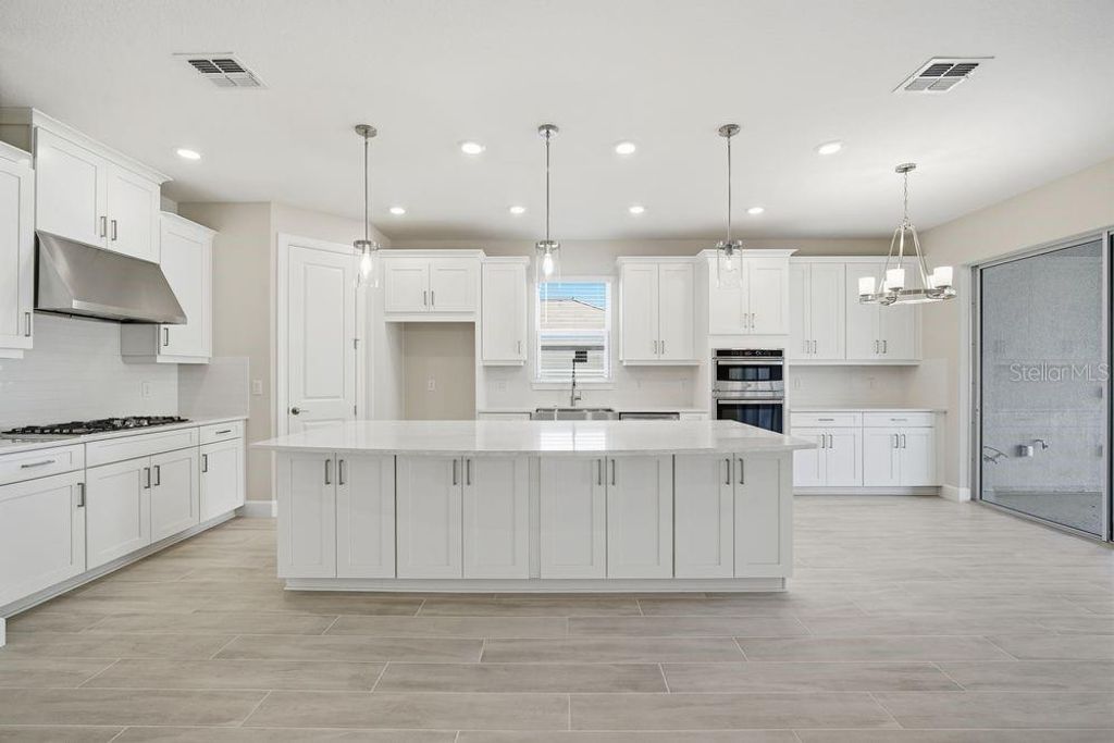 Photo of 30167 Imperati Boulevard, Wesley Chapel, FL 33543 (MLS # TB8471461)