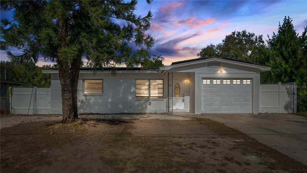 Photo of 306 E 119th Avenue, Tampa, FL 33612 (MLS # O6372559)