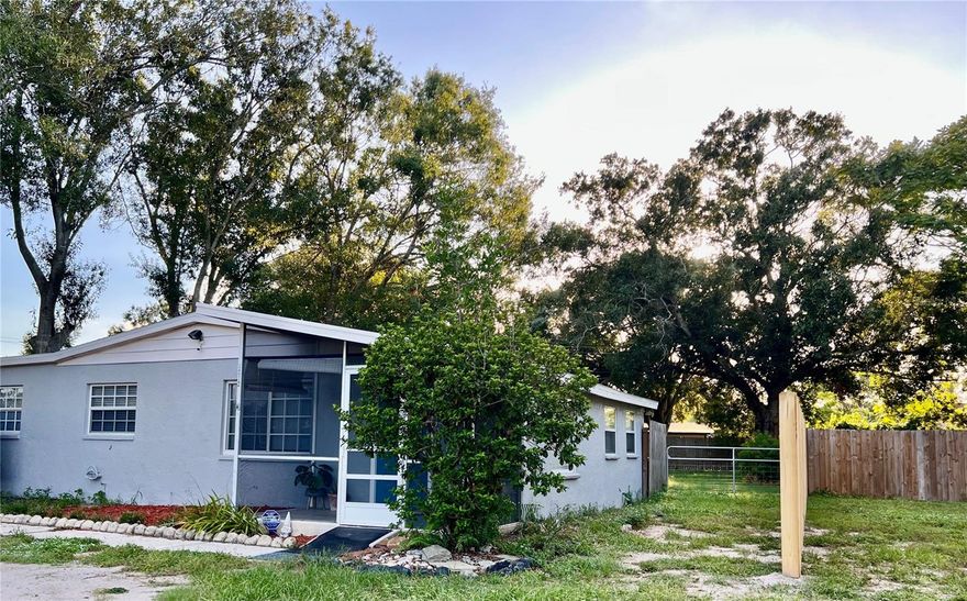 PRICE REDUCED! Seller is motivated! No HOA fee! No deed restrictions! Seller is offering 1% of purchase price in concessions  at closing toward point buy down or toward buyers closing costs. 
Charming 3-Bedroom turn key Home with many Upgrades including new roof 2022, crown molding, baseboard trim,  and an Expansive new fenced Back and side yard for more privacy.  (2/1 as per county)

 Turn key furnished residence, perfectly nestled on a generous lot. Boasting a brand new roof and a fresh coat of paint both inside and out.

Step inside to a warm, inviting interior, where stainless steel appliances take center stage in the well-designed kitchen. Home chefs will be delighted by the high-end KitchenAid dishwasher and range, complete with a double oven and an innovative air fryer function - perfect for culinary adventures!

Both comfort and health are prioritized with a recent professional cleaning of the HVAC and AC duct system, ensuring clean and fresh air circulation throughout. The bathroom showcases contemporary updates, and the new electrical panel ensures safety and reliability.

Expand your living space with a versatile spacious bonus room, ideal as a den, a master bedroom, with the existing laundry room having the potential and space to create your master bathroom or whatever suits your needs. The dedicated office space is perfect for today's work-from-home demands or can serve as a creative studio.

Venture outside to discover a vast fenced yard, providing both privacy and endless possibilities for outdoor enjoyment. Gather around the stone fire pit on chilly evenings, create a garden paradise, or simply enjoy weekend barbecues under the sun. Plenty of space for your boat or toys. 

This home isn't just a place to live—it's a lifestyle. With its blend of classic charm and modern amenities, it offers an unparalleled living experience for its next lucky owner.

Schedule your tour today and be captivated by all this home has to offer! Security camera's are in place on the property.https://my.matterport.com/show/?m=snzodYQ8YRK