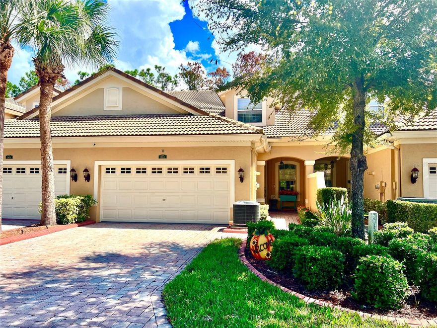 Stunning 3-Bedroom, 2.5-Bath Home with Loft and Office in the Gated Community of The Sabals Townhomes. Nestled in a serene, maintenance-free conservation lot, this impeccably maintained home offers privacy and tranquility, surrounded by lush landscaping and mature trees. Located in a non-flood zone and free of CDD fees, this gem is a true retreat. The Sabals Townhomes community boasts a charming boardwalk with a gazebo, winding through a cypress preserve — perfect for morning jogs or leisurely strolls with your dog. 
As you approach the home, you're greeted by a paved driveway leading to a welcoming front porch, complete with a glass-panel front door. Step inside to discover a beautifully updated interior featuring a modern color palette, recently painted walls, and hardwood floors that create an inviting atmosphere throughout the main level. The gourmet kitchen is a chef’s dream, showcasing elegant granite countertops, a tumbled marble backsplash, and upgraded raised-panel wood cabinetry. Enjoy the convenience of a natural gas stove, newer appliances, and a breakfast bar that opens to the dining and family room combination. The open-concept layout is perfect for entertaining, highlighted by a built-in fireplace nestled in a decorative niche, as well as tasteful recessed lighting, new light fixtures, and crown molding for added sophistication. French doors lead to an extended covered patio, a private oasis that offers a peaceful view of the picturesque backyard, perfect for relaxing or entertaining. The spacious first-floor master suite is a true sanctuary, featuring cork flooring, a custom walk-in closet with built-in shelving, and a beautifully remodeled en-suite bath. Indulge in the oversized double shower with a built-in bench, complemented by a hardwood vanity, double sinks, granite countertops, and modern fixtures that elevate the space. Additional first-floor amenities include a half-bath with designer lighting and mirror, as well as a full-size laundry room complete with a utility sink and cabinetry. A custom wrought-iron staircase leads to the second floor, where you'll find two bright and airy bedrooms with plush carpeting, ceiling fans, and ample closet space, including a walk-in closet in one. The loft-style family room offers versatility as an additional living area or play space, adjacent to a bonus room or office. The second floor also includes a spacious storage room to meet all your organizational needs. Ideally located near restaurants, shopping centers, hospitals, and only 35 minutes from the airport, this home offers both convenience and comfort. The nearby beaches are just a short drive away, making it the perfect blend of relaxation and accessibility.