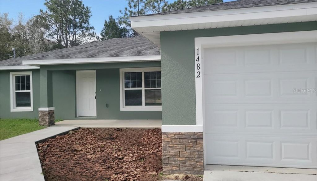 Photo of 1482 W Manchester Drive, Dunnellon, FL 34434 (MLS # OM712800)