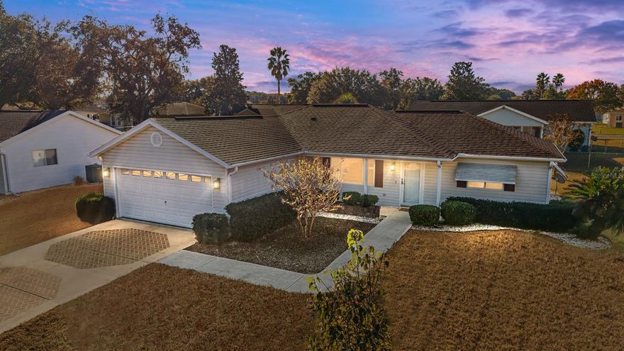 CUTE AND COMFORTABLE ! This 2 bed, 2 bath, 2 car garage home is spruced up and ready for new owners !! With a NEW ROOF IN 2024, HVAC 2022, WATER HEATER 2020 PLUS,  a favorite open floorplan with a large kitchen island ideal for meal prep and entertaining. Stainless appliances and black accents and accessories add a stylish touch that flows thru the home.  The split bedrooms offer large walk-in closets. Inside laundry room  has washer/dryer, wash tub and a screen door to the garage. Great location with easy access to Golf Course and Community amenities and activities pool, hot tub, pickleball, tennis, shuffleboard, corn hole, fitness center, water aerobics, yoga, exercise classes, billiards, crafts, cards, game nights, bingo, bunco, potluck dinners, dances, shows, social and travel groups. Less than 4 miles from golf, groceries, hospital/medical, shopping, restaurants, gas, banking, nature trails for hiking and biking. North Central location is ideal for day trips all across Florida from the Gulf to Atlantic and a plethora of stops in between.