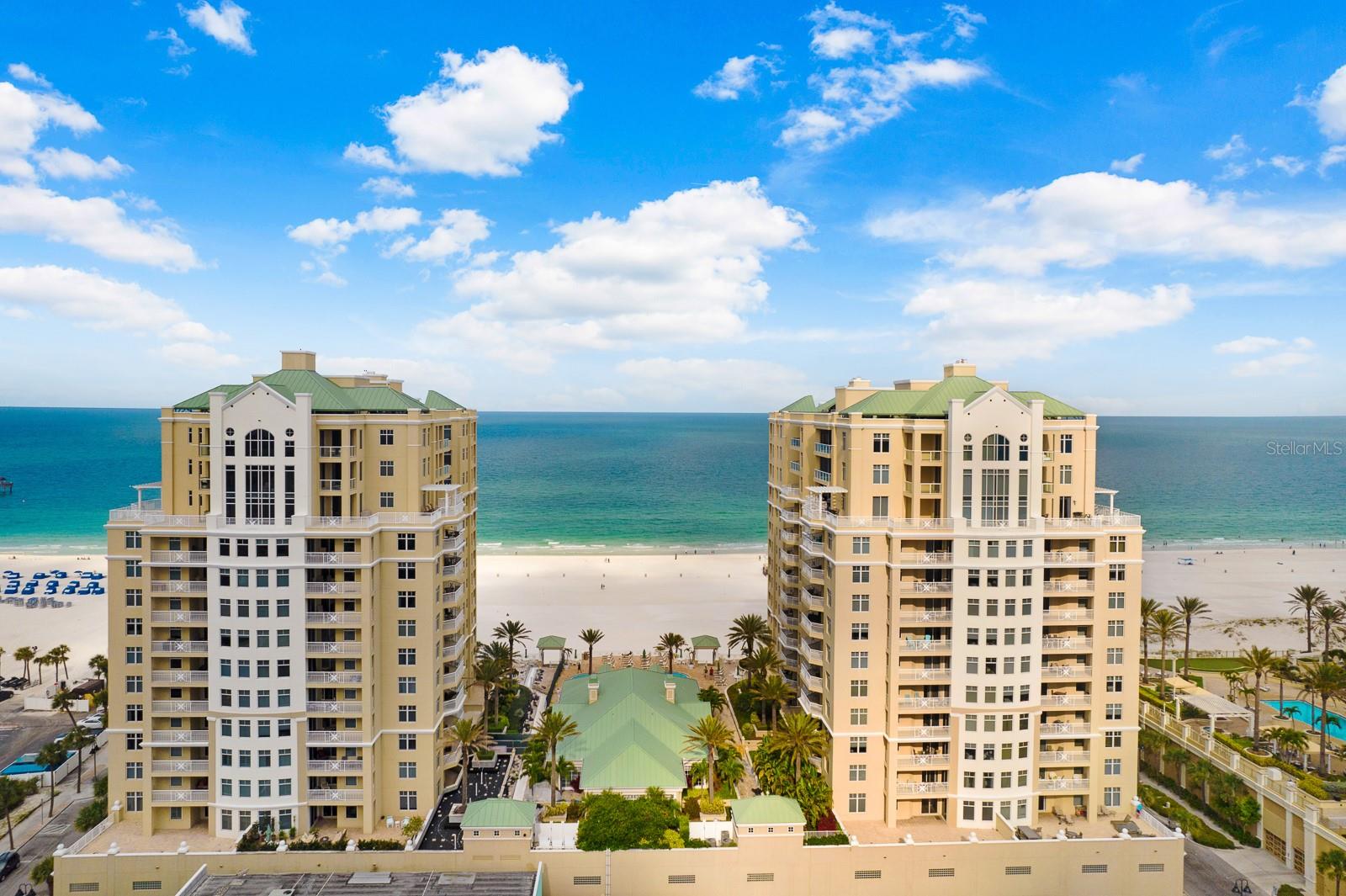 Welcome home to the luxury of Mandalay Beach Club! Premier condo living in the heart of Clearwater Beach! Gulf front living at its finest! Magnificent views in this Gulf front home with 3 bedrooms and 2.5 baths boasting 2,530 sq.ft. of wide-open space, custom created luxury and panoramic water views! Meticulously maintained and designed for the most discerning buyer. This home is an entertainer’s delight. Large gathering areas to take in the views, a chef’s kitchen and a balcony that will certainly serve as a hub of activity for the landscape beyond! Wow! The beach views, the sights… take it all in… this is a lifestyle!! The gorgeous kitchen has all that you’d expect with top-of-the-line ss appliances, furniture quality cabinetry, designer tilework and counters and plenty of space for family and guests. The primary bedroom with massive walk-in closet and ensuite are fabulously situated to take advantage of the views and create a spa like atmosphere. Views from every corner! Pride of ownership throughout! Luxury finishes from lighting pendants to plumbing fixtures, elegant details at every turn, full laundry room, beautiful details! All this with the unsurpassed luxury of the fabulous, pet friendly Mandalay Beach Club! 24-hour guard gate entry to your own resort haven! Beach front Tommy Bahama clubhouse pool and hot tub with grills and community room with billiard tables and relaxing fish tanks, fitness center with sauna and steam rooms, on-site management, two assigned covered parking spaces and storage, and located in the hub of Clearwater Beach! A true tropical paradise! Your lavish beach lifestyle awaits!