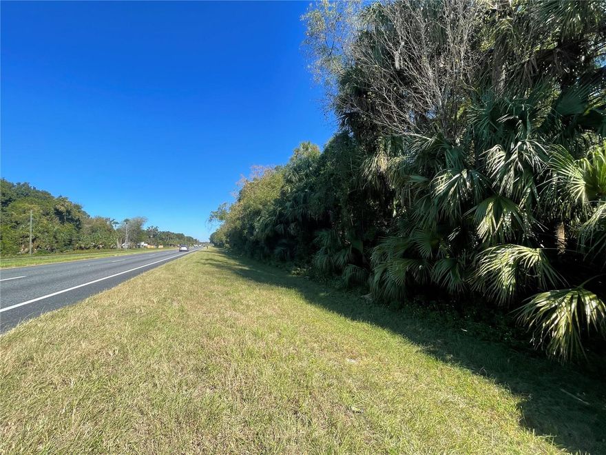 Located approx 1 mile from Citra intersection of 318/US Hwy 301. 5.51 Acres of Manufactured Zoning. 329' highway road frontage. Short drive  to I-75 via 318 or Hawthorne and quick route to Gainesville. Citra, Florida is known as the home of the pineapple orange, (originally called the Hickory orange) a name coined in 1883 for an orange (fruit) with an aroma reminiscent of the pineapple. Citra has two buildings on the National Register of Historic Places: It is home to a University of Florida Institute of Food and Agricultural Sciences plant research facility. Some funs things to do include visiting Animal Rescue Sanctuary or stop by The Orange Shop for fresh squeezed Florida Orange Juice or some cool merchandise. Skunkie Acres offers horse back riding and every local loves visiting Crones Cradle Conserve with great outdoor gardens and country store full of local homemade foods and stuff. Located just short drive to Ocala or Gainesville, don't miss this great property surrounded by horse country.