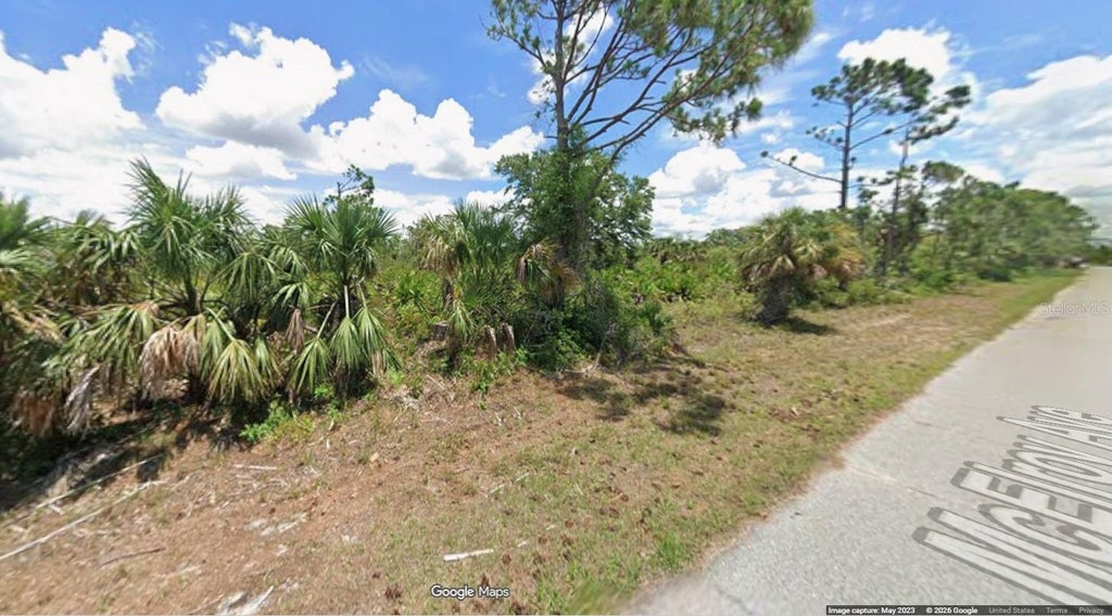 Photo of 12102 Mcelroy Avenue, Port Charlotte, FL 33981 (MLS # O6450229)