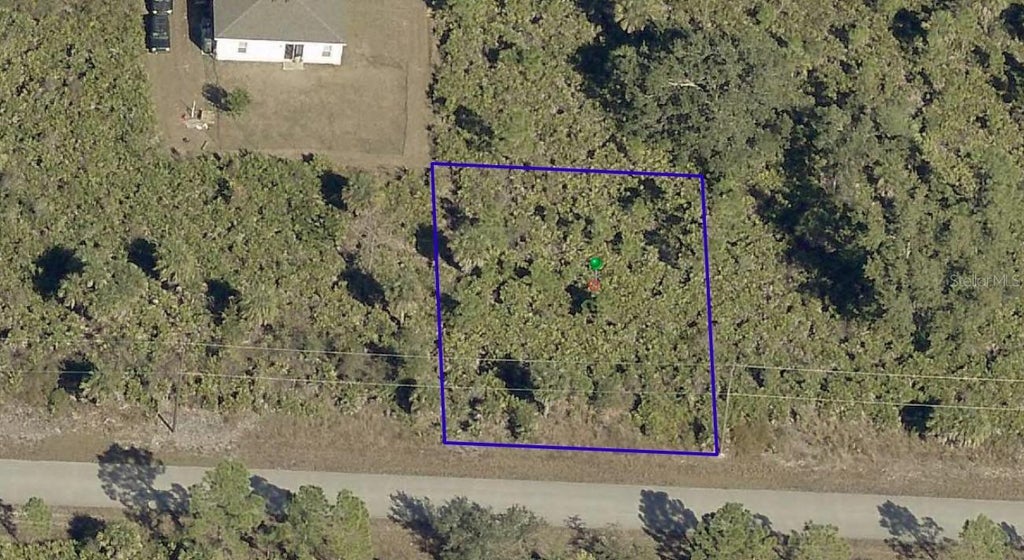 Photo of 12102 Mcelroy Avenue, Port Charlotte, FL 33981 (MLS # O6450229)