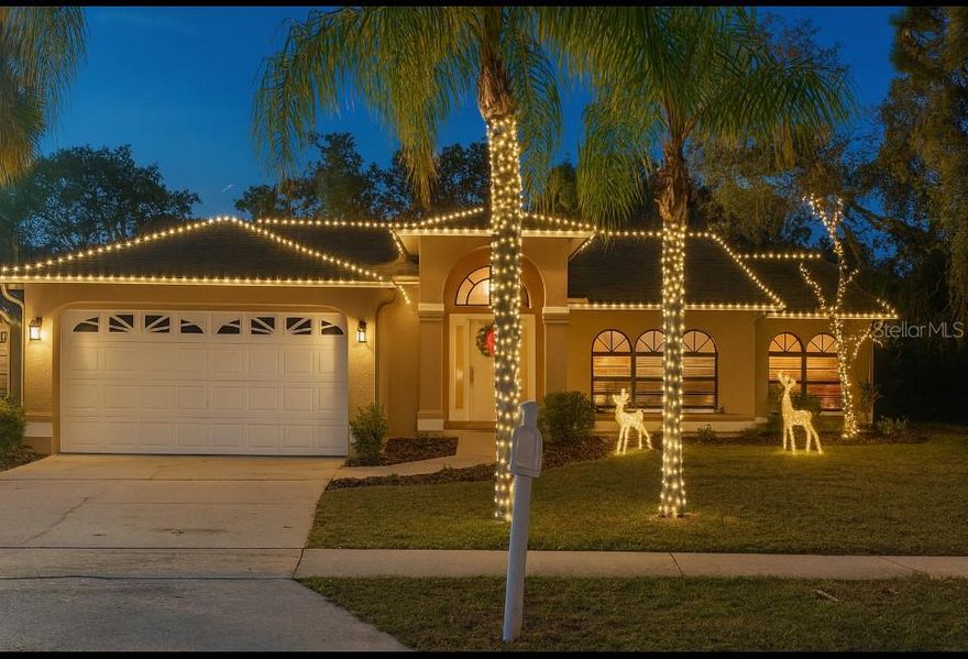 One or more photo(s) has been virtually staged. WHAT COULD BE BETTER THAN A NEW HOME FOR THE HOLIDAYS! This newly remodeled residence provides turn key convenience, featuring a brand new kitchen, interior paint, LVP flooring, and updated fixtures throughout. Upon entry, the spacious living room adjoins a dinette area with views of the modern kitchen. The kitchen is equipped with soft-close cabinetry, granite countertops, a farmhouse sink, and upgraded stainless steel appliances. The primary suite offers an updated bathroom complete with dual sinks and a walk-in shower. Two additional bedrooms are situated on the opposite side of the home near a renovated guest bathroom with a tub/shower combination and access door to the pool for convenience. The screened, covered porch overlooks the swimming pool and a massive, fully fenced backyard. Located in Arlington Woods Subdivision, the property is convenient to local restaurants, shopping venues, and easy access to US 19 and Veterans Pkwy. Flood insurance is not required and the home has no history of flooding.