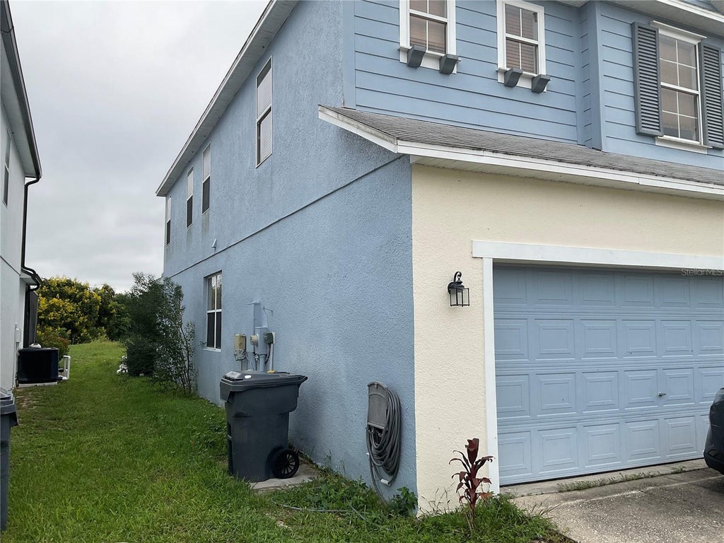 Photo of 1735 Pine Ridge Drive, Davenport, FL 33896 (MLS # O6441276)