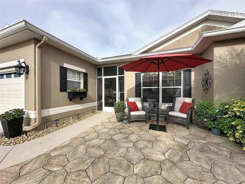 Photo of 5000 Long Meadow Drive, Leesburg, FL 34748 (MLS # G5106115)