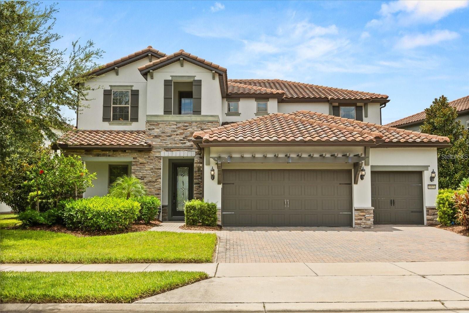 This Property is situated in the gated community of Ruby Lake. Four spacious bedrooms, three full baths and two half baths. Open floor plan throughout the living area, sliding glass doors to the covered lanai and pool. The home features a first floor office that could serve as a fifth bedroom. The Kitchen overlooks the main living area. The community amenities include a resort style pool, splash park, fitness center and scenic fishing pier. The location is just minutes from Disney Springs, restaurants and shopping.