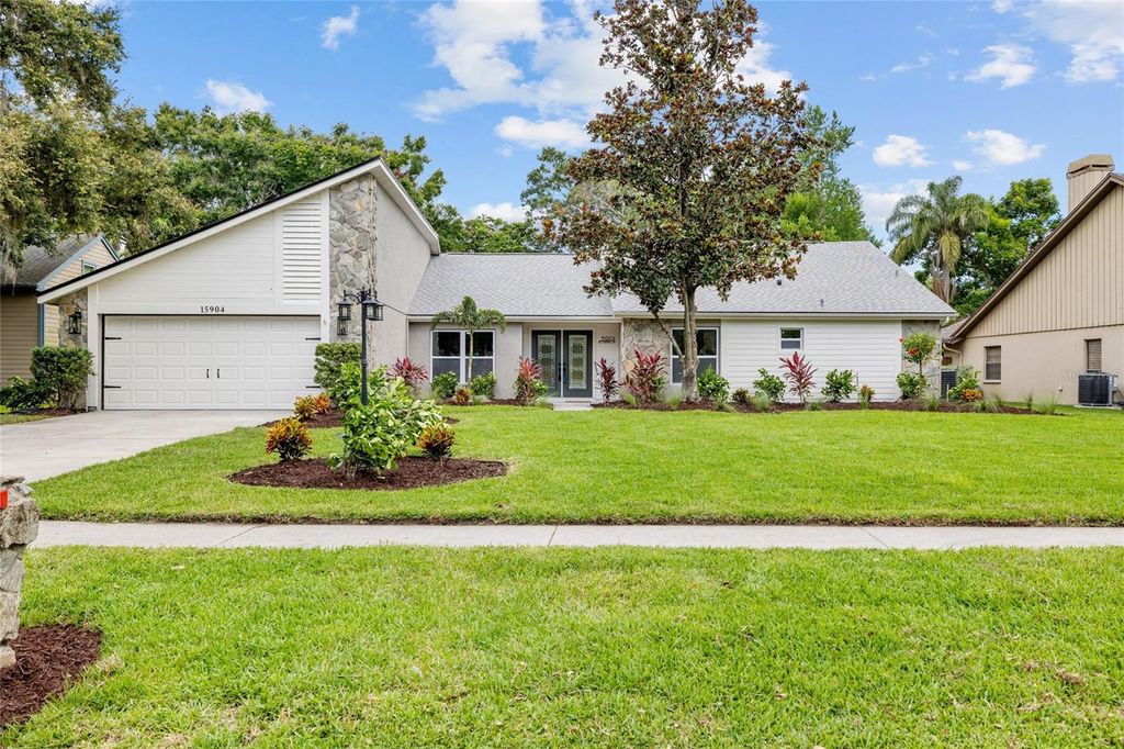 Photo of 15904 Nottinghill Drive, Lutz, FL 33548 (MLS # TB8406762)