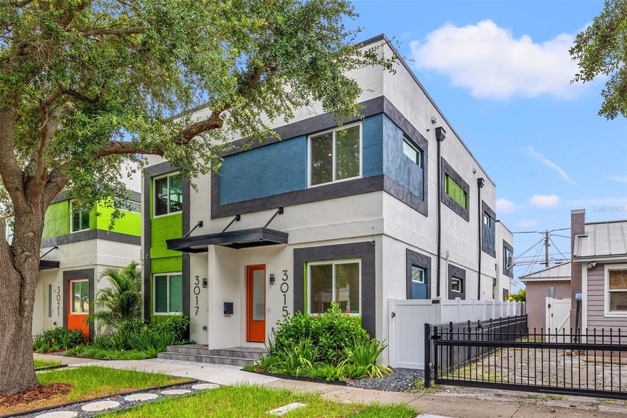 2.99% Financing for Qualified Buyers! NO HOA! NEW CONSTRUCTION! NO FLOOD INSURANCE REQUIRED! Seller offering 3-2-1 Buy Down OR Up to $30k in seller concessions with accepted offer. No need to wait for rates to drop. You can begin enjoying the Florida Lifestyle right away! This townhome is all about lifestyle. Located in the Grand Central District in the heart of the City, just 1 block off Central Ave. Walk or bike to Vibrant downtown St Pete; with a multitude of new restaurants, bars, shopping, music venues, sporting events and beaches! The interior of this contemporary home is impressive! Upon entering you will notice high ceilings, open floor plan with a spacious living and dining room that flows seamlessly into a sleek European chef's kitchen with Samsung Bespoke Stainless Steel appliances, quartz countertops, and stylish fixtures. Smart-home wired and ready for all your technology needs and ambient lighting throughout, make this property the quintessential Florida entertaining home! Located upstairs, the primary bedroom with a luxurious ensuite bath and finished walk in closet, make this room a perfect evening retreat. A second bedroom with its own ensuite bathroom and an upstairs laundry room round out the upstairs. A low maintenance xeriscape paver courtyard is the ideal backdrop for easy outdoor entertaining. Alley access to an oversized one car garage complete with a 220V EV charging outlet and epoxy floors allow for convenient parking. This home has it all; including a unique Accessory Dwelling above the garage with a private entrance ideal for an in-law suite, guest accommodations, home office, private retreat or rent it out and benefit from the income this suite can provide. Current zoning permits AirBNB and VRBO! This ADU is private but offers the luxury of a downtown hotel. Don't miss this rare opportunity to live in style, just steps from all the Grand Central District and downtown St Pete has to offer!