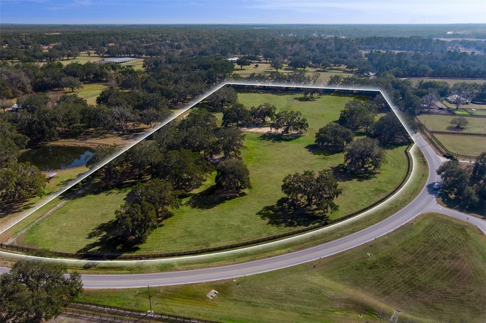 This beautiful 16.67-acre property in Ocala offers the perfect blend of tranquility and convenience, located just 10 minutes from the renowned World Equestrian Center! The land is graced with mature granddaddy oaks, adding a stunning natural element to the space. With ample room for a custom home, farm, or equestrian facilities, this property is an ideal choice for those looking to embrace the peaceful countryside while remaining close to the attractions and amenities of Ocala. Whether you’re seeking privacy or a prime location for your next venture, this land offers endless possibilities in a truly desirable area.
